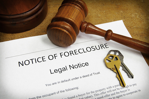 Foreclosure document with house keys and gavel HCW Legal Real Property Eviction HOA Debt Collection Attorneys Gainesville Florida